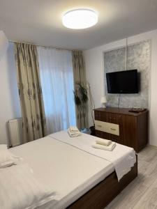 TV a/nebo společenská místnost v ubytování Casa Leny