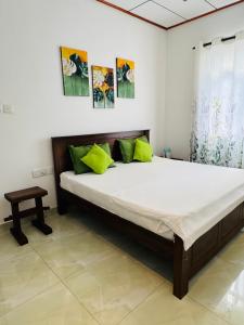 Ένα ή περισσότερα κρεβάτια σε δωμάτιο στο Cozy Haven Guesthouse