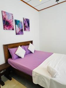 Ένα ή περισσότερα κρεβάτια σε δωμάτιο στο Cozy Haven Guesthouse