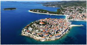 an aerial view of a small island in the water at Apartment Dane in Primošten