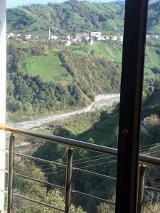 a view from a window of a valley with a river at Şimal villa konaklama in Şehitlik