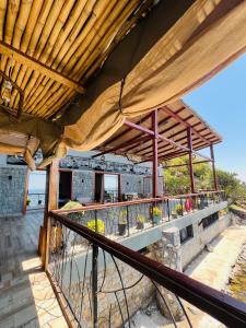 En balkon eller terrasse på Waghill B Cottage