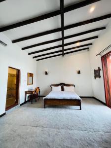 En eller flere senge i et værelse på Waghill B Cottage