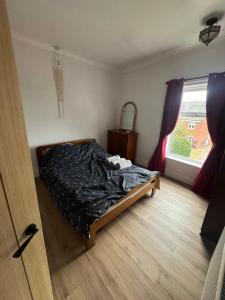 Ένα ή περισσότερα κρεβάτια σε δωμάτιο στο Daniel’s Semi Rural Retreat