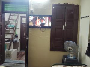 Et tv og/eller underholdning på Thanalakshmi Homestay only for Family