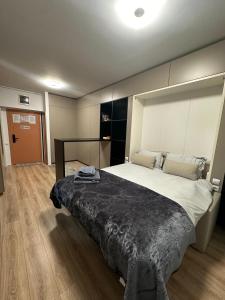 a bedroom with a large bed in a room at Splendid view Sinaia in Sinaia +114 photos