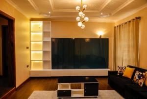 Et tv og/eller underholdning på Eco Safari House