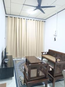 Μια τηλεόραση ή/και κέντρο ψυχαγωγίας στο Homestay Teratak Adamia