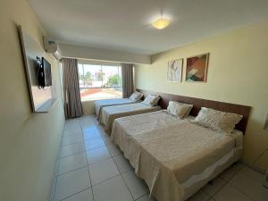 Postel nebo postele na pokoji v ubytování Hotel Bessa Atlântico + 29 fotografií