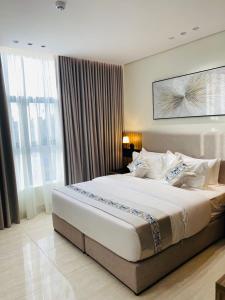 Postel nebo postele na pokoji v ubytování ليناتيل للشقق المخدومه