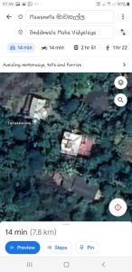 a screenshot of a picture of a boat in the water at Turusewana rest in Kegalle