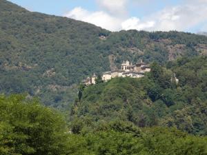 a house on the side of a mountain at La Casetta in Breia +11 photos