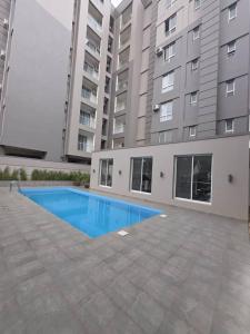 Πισίνα στο ή κοντά στο Primrose Apartments Kololo