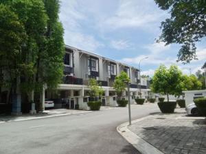 an empty street in front of a large building at Teddyslodge Homestay in Kajang