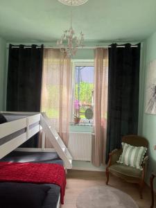 a bedroom with a bunk bed and a window at Maison Layla in Spa +35 photos