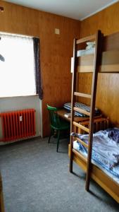 Ένα ή περισσότερα κρεβάτια σε δωμάτιο στο Ferienwohnung Südstrand