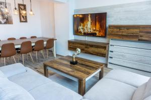 Posezení v ubytování KOA - Sunset Penthouse