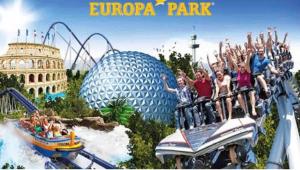 a group of people on a roller coaster in a theme park at Vivez l'Alsace! Piscine, Montagne&Noël Magique in Thann