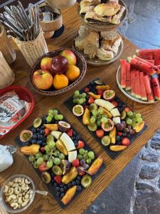 a table with many different types of fruits and vegetables at Hotel Kocour in Třebíč