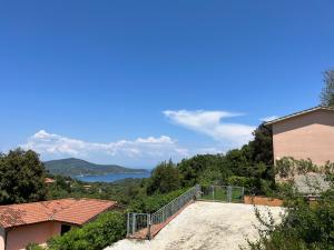 a view of the water from a house at Residenza Le Agavi in Capoliveri in Capoliveri