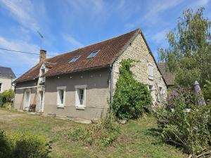 an old brick house with windows and a roof at Berrichonne house near Beauval Zoo in Jeu-Maloches