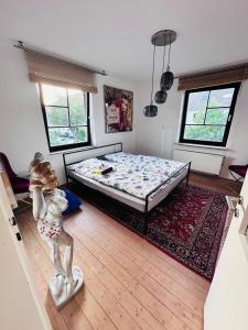 Postel nebo postele na pokoji v ubytování S-Art Living