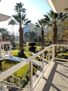 a view from the balcony of a resort with palm trees at Villa don Tomás in Villa Krause