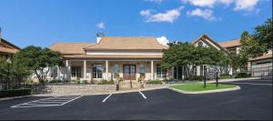 a house with a parking lot in front of it at Landing San Antonio Far North Central in San Antonio