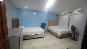 Ένα ή περισσότερα κρεβάτια σε δωμάτιο στο Gabriela House