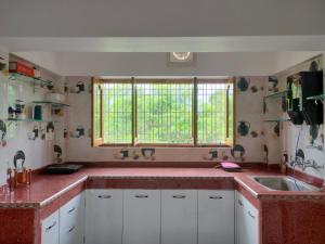 Η κουζίνα ή μικρή κουζίνα στο Prasads Homestay +36 φωτογραφίες