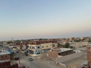 an aerial view of a city with buildings at Aladdin inn نزل علاء الدين in Qasr Al Farafirah