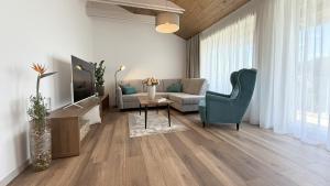 Телевизор и/или развлекательный центр в Apartments Čerešňový Sad & Wellness +30 фотографий