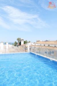 Bazén v ubytování Casa de la Costa - Pintor Clemente bajo nebo v jeho okolí