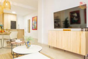 TV a/nebo společenská místnost v ubytování Casa de la Costa - Pintor Clemente bajo