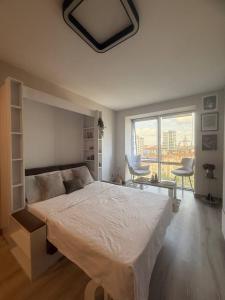 Ένα ή περισσότερα κρεβάτια σε δωμάτιο στο studio apt 5 min by walk to metrobus