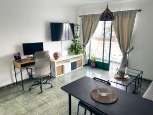 TV/trung tâm giải trí tại Mamarosa Fuerteventura Base Perfecta 5min Aeropuerto & Teletrabajo