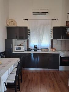 Η κουζίνα ή μικρή κουζίνα στο La Rosa