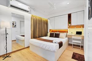 Una cama o camas en una habitación de Livara Stay