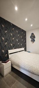 Postel nebo postele na pokoji v ubytování Studio a Ciney