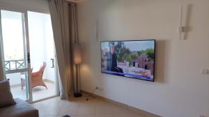Televiisor ja/või meelelahutuskeskus majutusasutuses Sunterra Resort