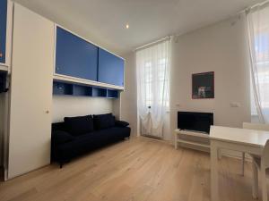 TV a/nebo společenská místnost v ubytování Cozy 1 Apartment - City Center Train Station + 10 fotografií