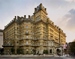a large building with a tower on top of it at The Langham London in London