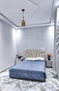 Postel nebo postele na pokoji v ubytování Appartement chic et moderne à Kénitra