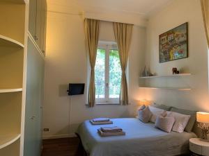 Postel nebo postele na pokoji v ubytování ISOLA Rooms - Isola pedonale Crocetta Politecnico