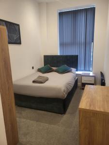 Postel nebo postele na pokoji v ubytování Coastline Family Retreat