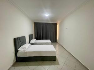 a bedroom with two beds in a room at Mode Tanger app in Tangier