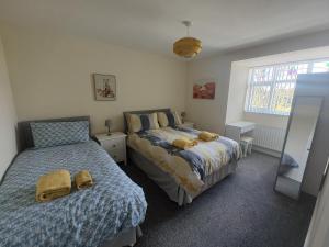 En eller flere senge i et værelse på Peasholm Penthouse, Scarborough