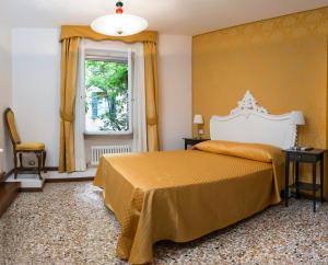 Postel nebo postele na pokoji v ubytování Casa Dolce