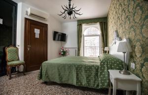 Postel nebo postele na pokoji v ubytování Casa Dolce
