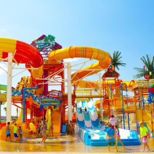 a group of people playing in a water park at Lg Deck-BBQ Grill - King Suite - Near RAFB in Bonaire